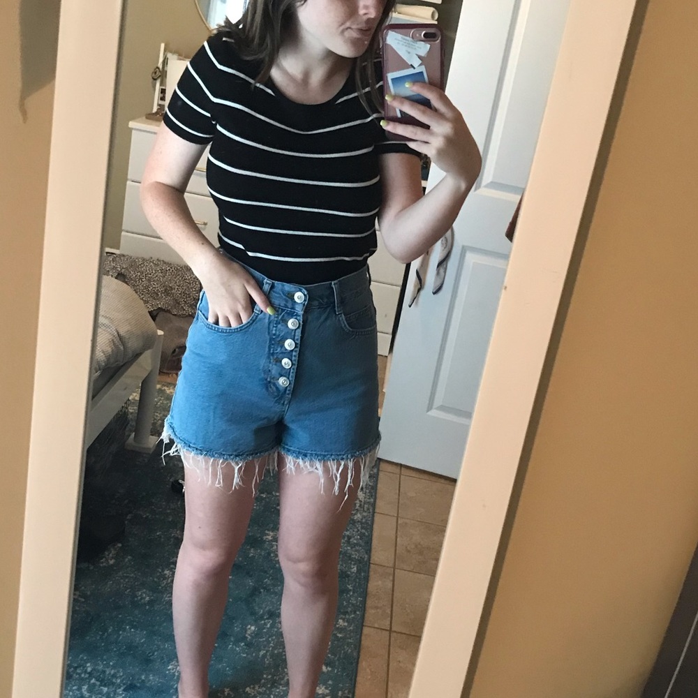 Black and white striped top.